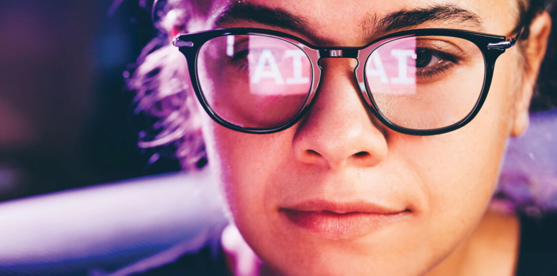 Woman working at a computer screen