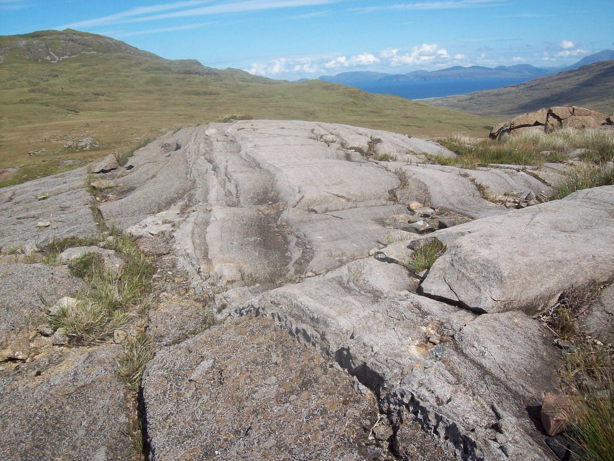 Striped rock in open hillside, Scotland