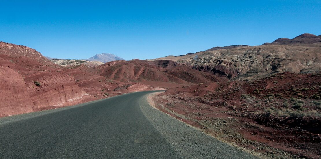 Road winding through desert mountains