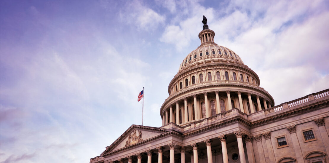 US Capitol building dome with American flag