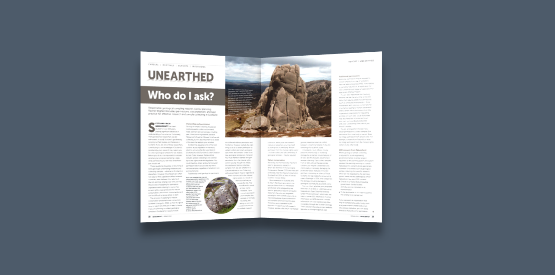 A magazine lying open to a double-page spread of an article with columns of text and photographs or rocks